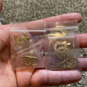 Gold platted Channel necklace and earring set.